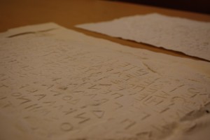 Paper cast impression of ancient Greek stone impressions