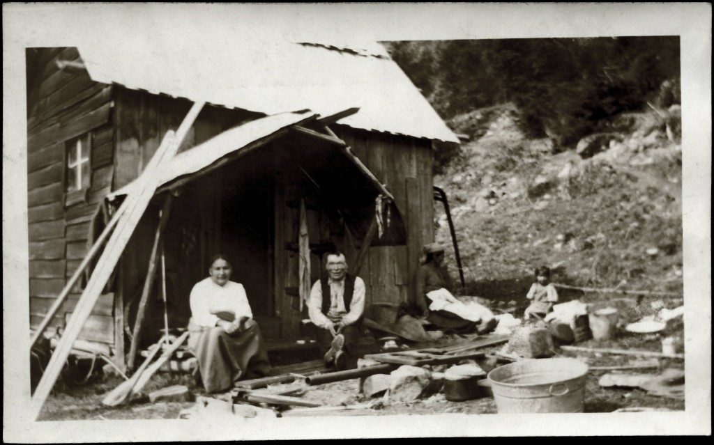A First Nations family appear outside a dwelling (c. 1915-1925). Photograph: Uno Langmann Family Collection