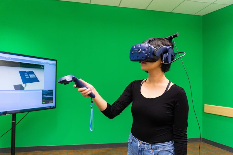 Student using Virtual reality equipment